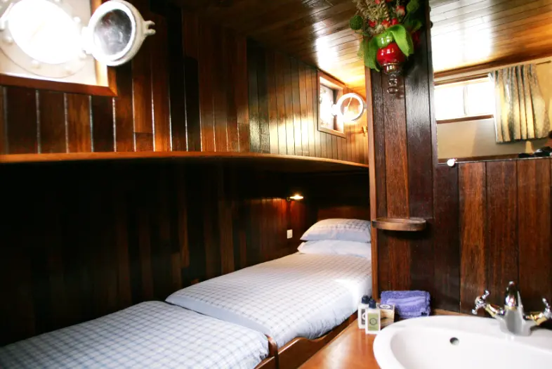 Private cabin with en-suite bathroom on hotel barge.